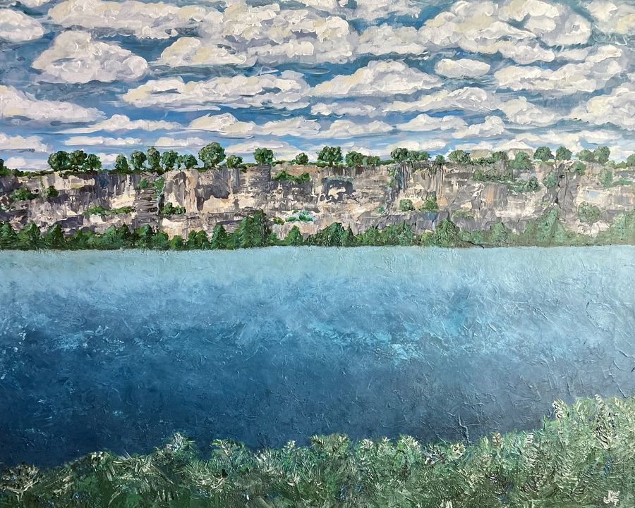 Paradise Point Cliffs by Jenny W. Green: Limestone cliffs topped with trees above a wide blue lake beneath rows of white clouds
